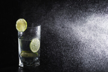 Cucumber water. Drinking water with fresh cucumber. Mineral water. Healthy, mineral-rich, refreshing water with cucumber.