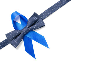 Men cancer. Blue ribbon, fashion bowtie isolated on white background. Awareness prostate cancer of...
