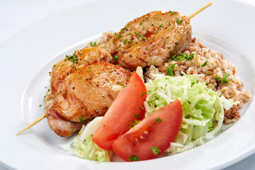 chicken kebab with buckwheat and salad
