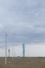 A pump house or pump station with big metal tube.