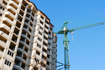 Construction site background. Crane near building. Industrial background.