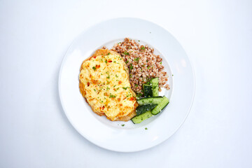 pork with buckwheat and cucumber