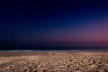 Cercles muraux Coucher de soleil sur la plage beach at night
