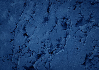 Blue wall with cracks