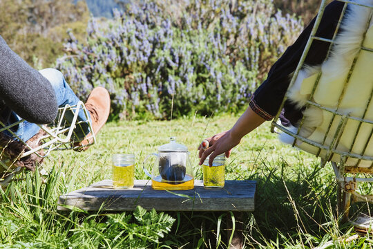 Couple drinking tea outdoors