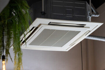 air condition hanging from ceiling. cassette type air conditioner.