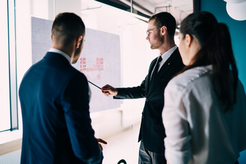 Attentive business workers discussing strategy