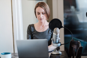 Woman Influencer Working in a Home Studio