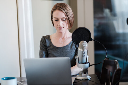 Woman Influencer Working in a Home Studio