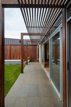 Sliding doors to back garden area with slatted timber eaves