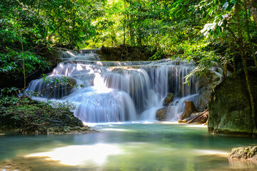 Fototapeta na wymiar Erawan Waterfall in National Park, Thailand