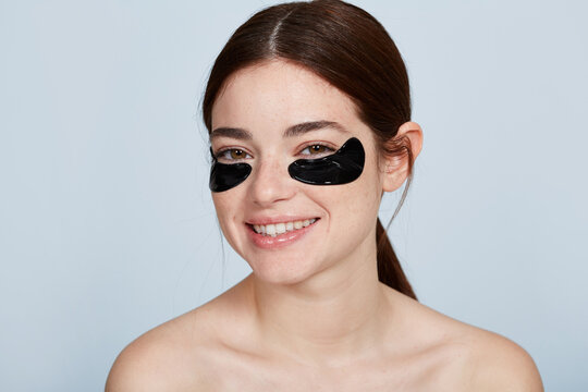 Smiling Woman Portrait With Under Eye Patch