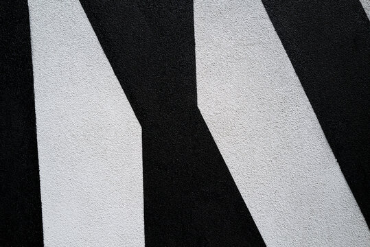 Black and white stripes painted on wall