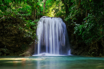 Fototapeta na wymiar Erawan Waterfall in National Park, Thailand