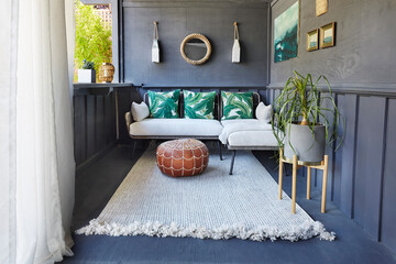 Tiki bar lounge area in backyard