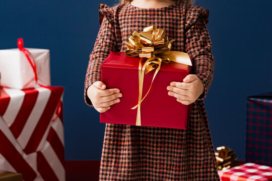 Toddler Girl Holding Present Box