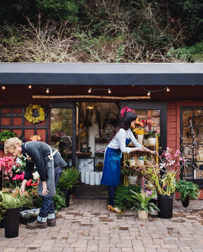Flower shop storefront with employees