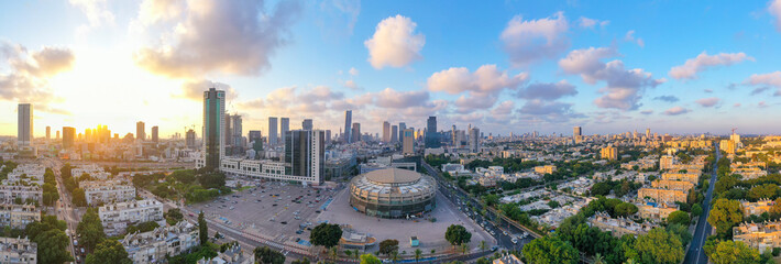 Tel Aviv skyline with Sunset light over the city business district, Aerial image. 
