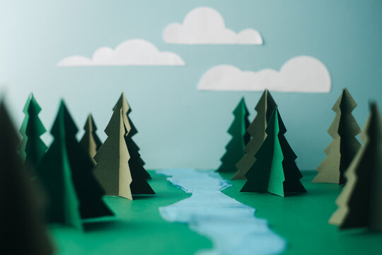 The Forest With River Made Of Paper And Plastic