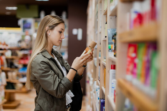 Woman making purchase in an ecological store