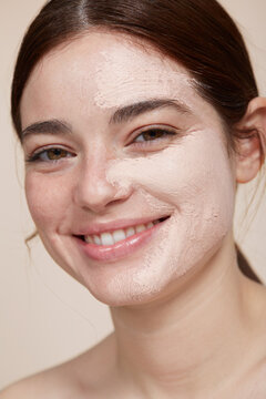 Young Woman With Pink Clay Mask