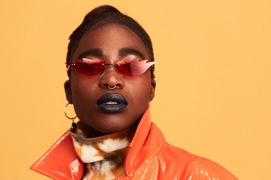 Stunning woman orange apparel portrait