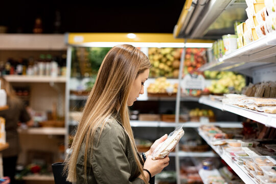 Woman making purchase in an ecological store