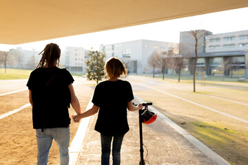 young couple spends time on electric scooter