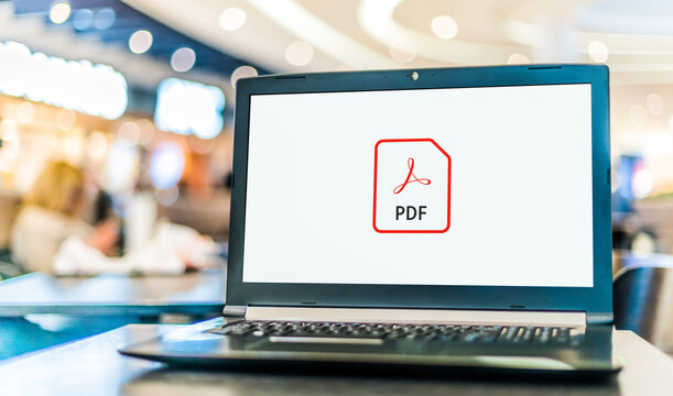 Laptop computer displaying logo of Adobe Acrobat file