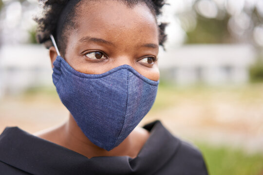 African woman with a face mask