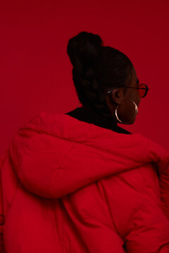 Back of woman in red coat