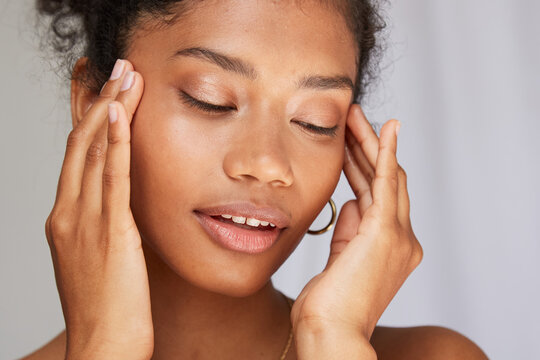Stunning girl face massage closeup
