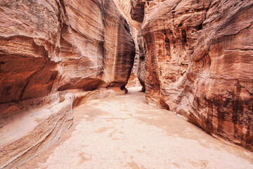 Al Siq Canyon in Petra, Jordan, pink red sandstone walls on both sides
