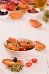 Toasted bread with tomato and oregano.