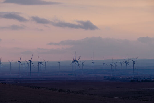 Windmill Turbines At Sunset
