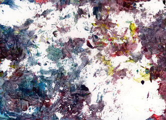 Macro photo of colorful oil paints and liquid paints fused into abstract waves pattern background