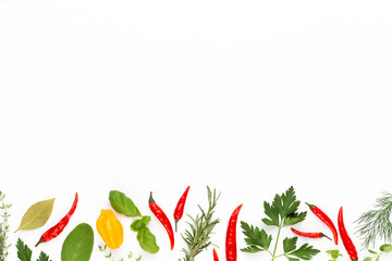 Naklejka premium Spice herbal leaves and chili pepper on white background. Vegetables pattern. Floral and vegetables on white background. Top view, flat lay.