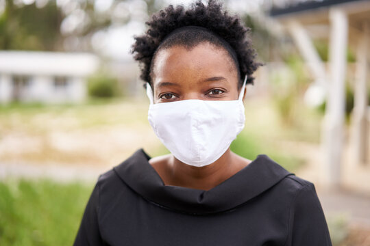 African woman with a face mask