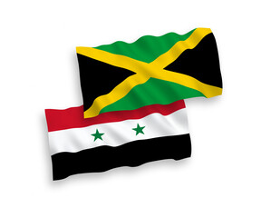 National vector fabric wave flags of Jamaica and Syria isolated on white background. 1 to 2 proportion.
