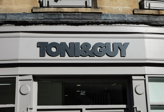 Bath, Somerset, UK, 22nd February 2019, Shop Sign for Toni and Guys Hairdressers