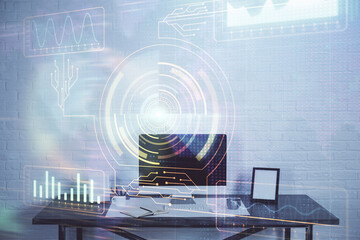 Double exposure of desktop computer and technology theme hologram. Concept of software development.