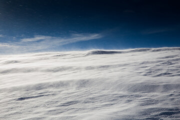 Abstract formations from snow and ice in heavy winter during blizzard. 