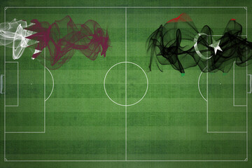 Qatar vs Libya Soccer Match, national colors, national flags, soccer field, football game, Copy...