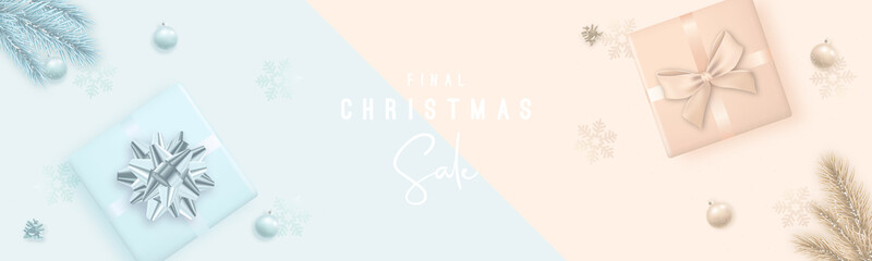 Merry Christmas and Happy New Year Sale banner. Long horizontal banner with fir tree branches, shiny baubles, gift boxes on patel pink and blue background. Vector illustration.