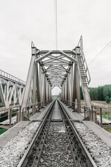 An Old Railroad Bridge. Railroad track. Interesting View of an Iron Truss