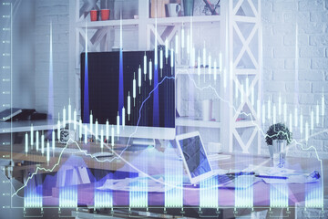 Financial market graph hologram and personal computer on background. Double exposure. Concept of forex.