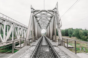 An Old Railroad Bridge. Railroad track. Interesting View of an Iron Truss