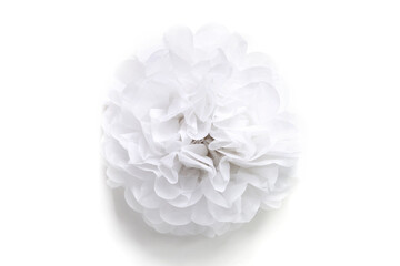White paper flower decorative on background. Close up, isolated