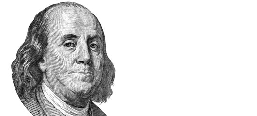 Benjamin Franklin on one hundred US Dollar bill. Money of United States. Isolated on white background. Business and finance concept. Copy space for text or design.