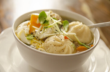 
small dumplings in broth with spices